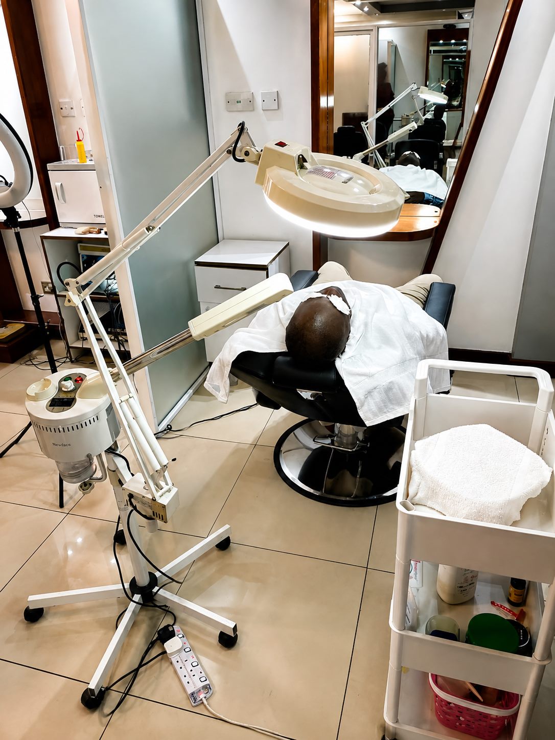 Client receiving a facial treatment